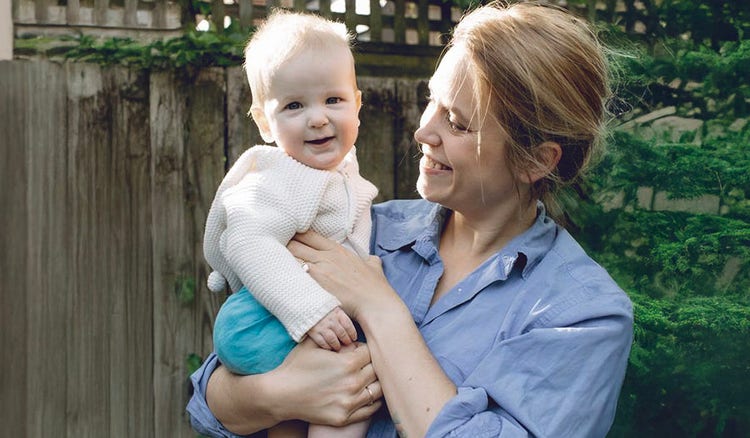 Mother holding infant